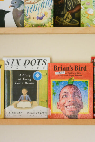 Braille children's books on a shelf