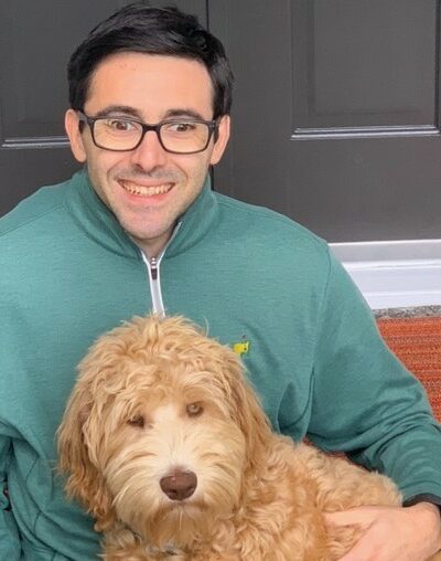 Cole Hardman with his dog.